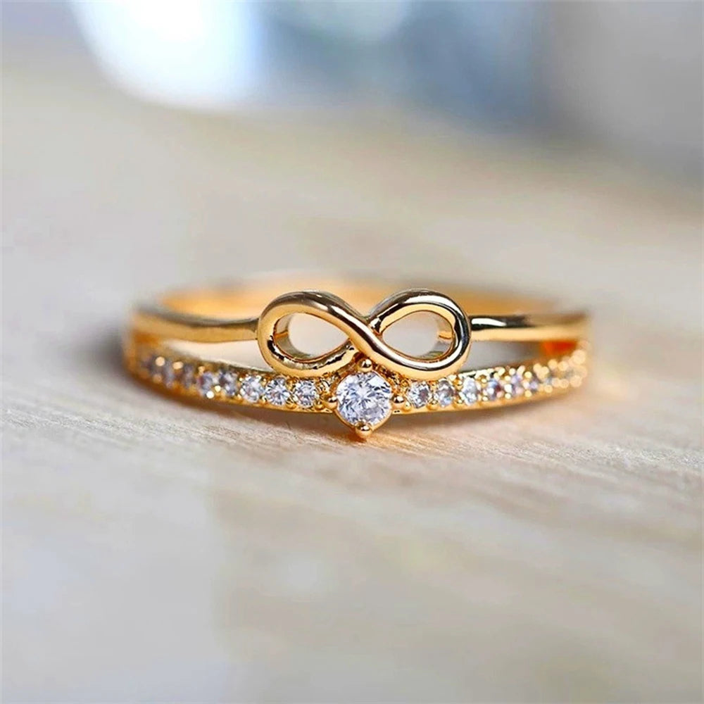 Bague élégante symbole infini — zircon étincelant, finition or rose