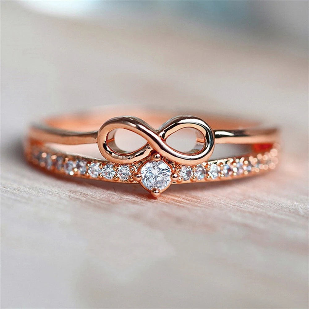 Bague élégante symbole infini — zircon étincelant, finition or rose