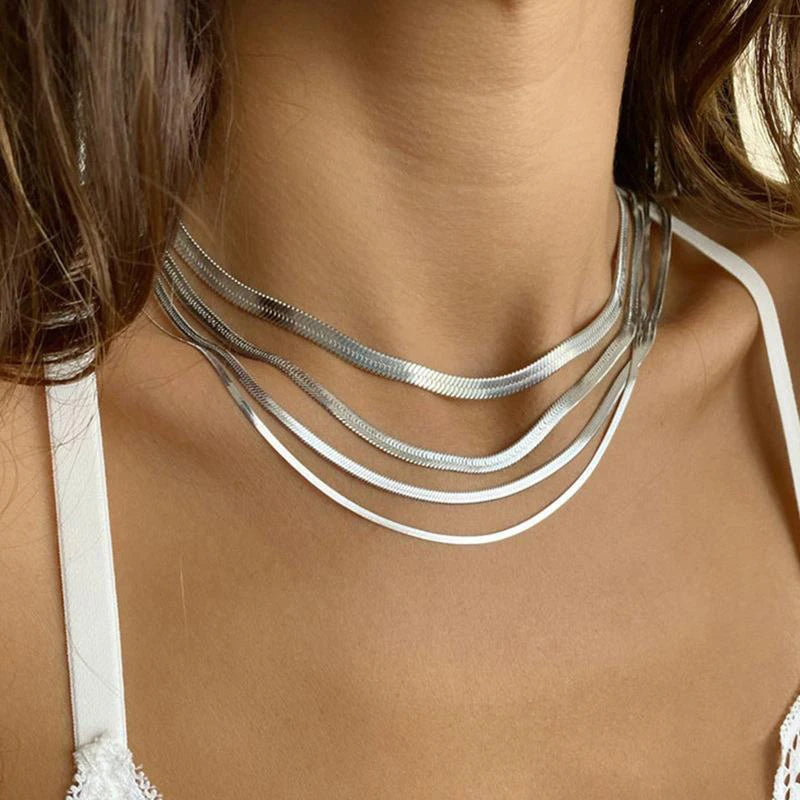 Collier ras-du-cou Herringbone — acier inoxydable or & argent, style chic et intemporel