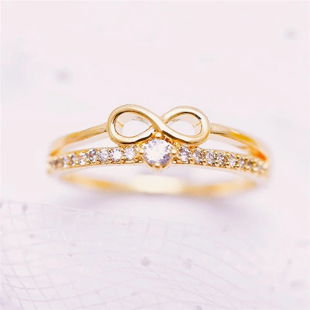 Bague élégante symbole infini — zircon étincelant, finition or rose
