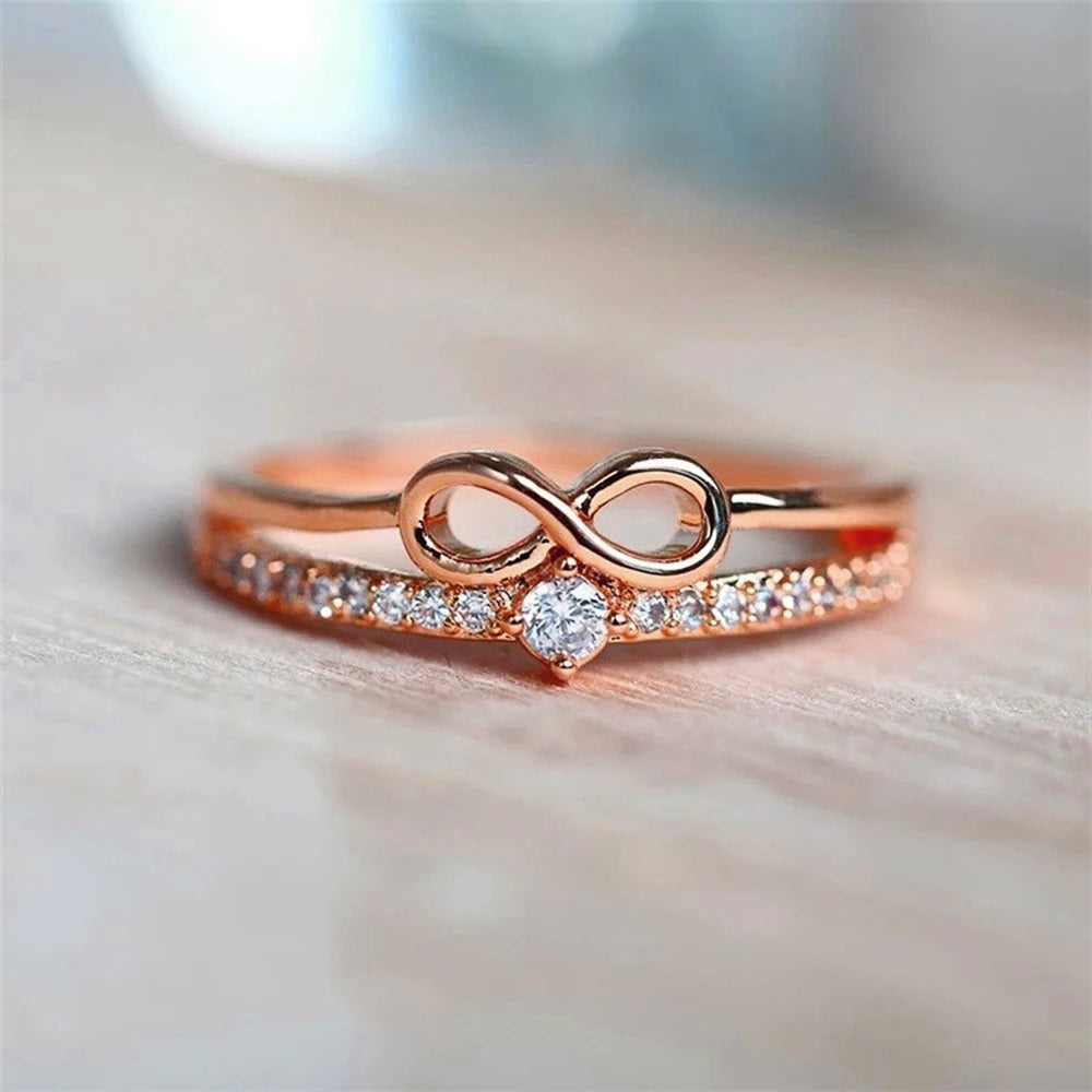 Bague élégante symbole infini — zircon étincelant, finition or rose