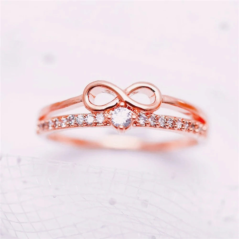 Bague élégante symbole infini — zircon étincelant, finition or rose
